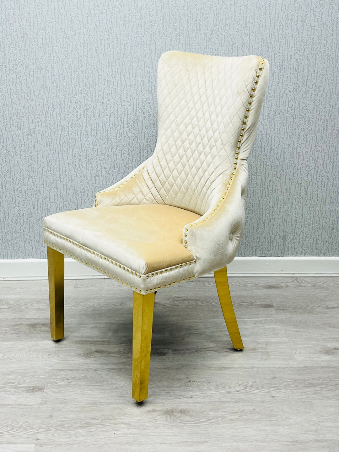 Arial Marble & Gold Dining Table With Victoria Quilted Ring Knocker Dining Chairs Gold Legs